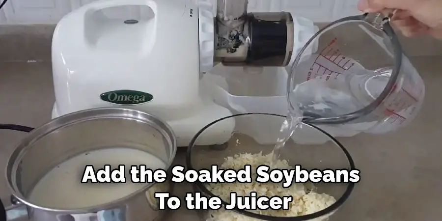 Add the Soaked Soybeans  To the Juicer